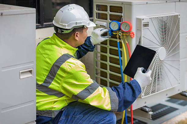 Professional Air Conditioning Repair technician working in Powers Lake, WI